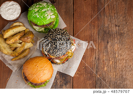 set of three mini homemade Burger. 48579707