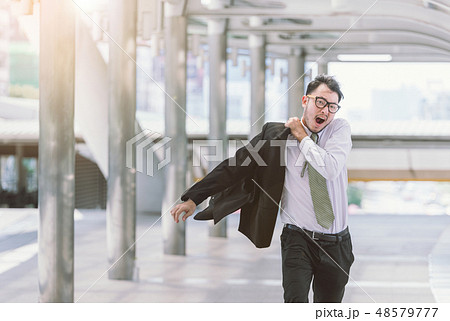 businessman in a hurry and running, he is late 48579777