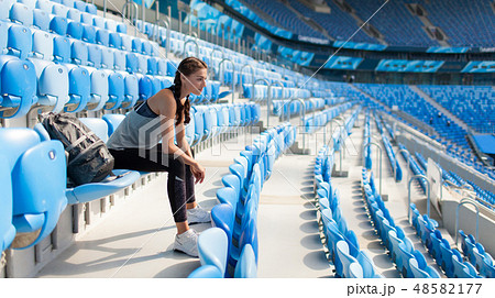Sexy girl posing at stadium. 48582177