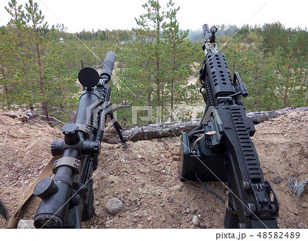 Assault rifle and machine gun. 48582489