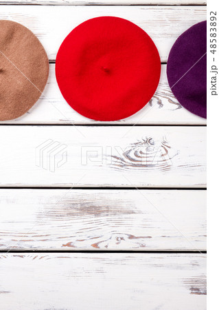 Set of female berets, copy space. Set of female berets, copy space. 48583892