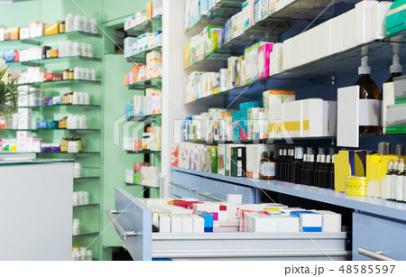 Medicine shelves in pharmacy - Stock Image - C039/0260 - Science Photo  Library