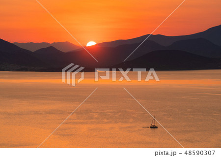 Lonely yacht sailing on silent sea. Caribbean sea. 48590307