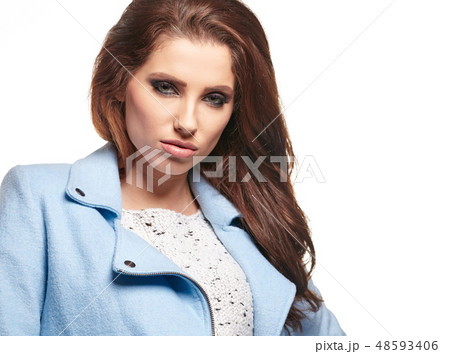Young woman in a blue coat 48593406