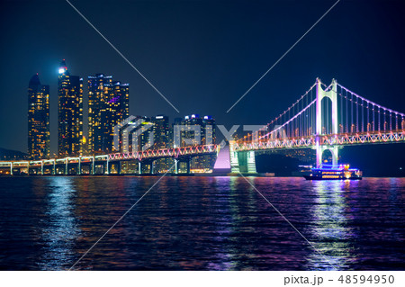 Gwangan Bridge and skyscrapers in the night. Busan, South Korea Gwangan Bridge and skyscrapers in the night. Busan, South Korea 48594950