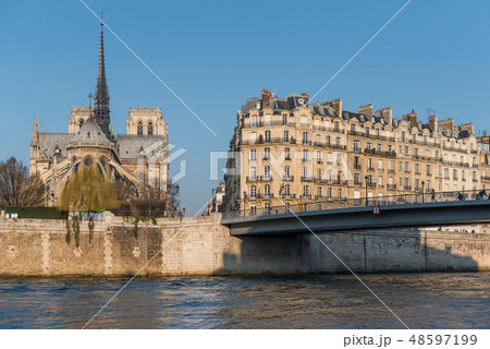 Notre-Dame cathedral at sunrise in Paris Notre-Dame cathedral at sunrise in Paris 48597199