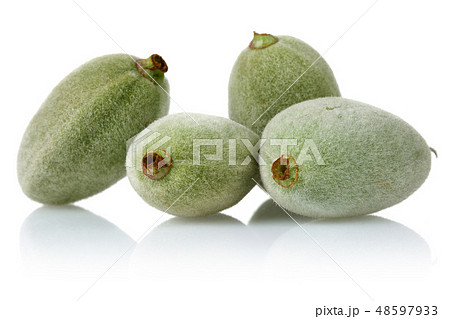 Fresh green almonds isolated on white Fresh green almonds isolated on white 48597933