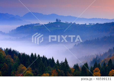 Twilight with fog in Slovenia. Saint Thomas Church 48599131