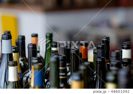 Group of wine bottles in a row. Group of wine bottles in a row. 48601092