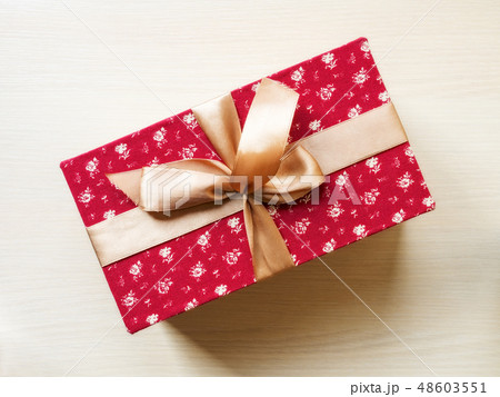 Gift box on the floor Gift box on the floor 48603551
