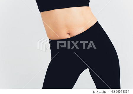 Women's black fitness pant isolated on white background with clipping path. Front view. Women's black fitness pant isolated on white background with clipping path. Front view. 48604834