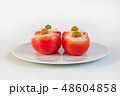 Stuffed tomatoes with rice, cheese and olives 48604858