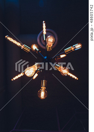 Vintage edison light lamps and cooper metal tube costruction. 48605742