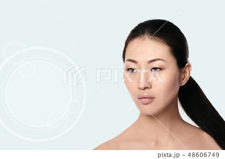 Spa portrait of attractive asian woman with arrows on her face 48606749
