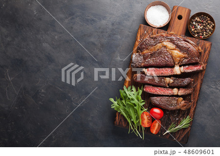 Grilled ribeye beef steak. Grilled ribeye beef steak. 48609601