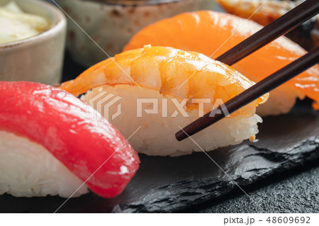 Sushi set of salmon, tuna and smoked eel. Sushi set of salmon, tuna and smoked eel. 48609692