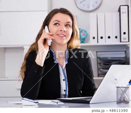 Portrait of female working in office Portrait of female working in office 48611390