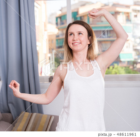 Pretty girl is training in time morning exercises Pretty girl is training in time morning exercises 48611961