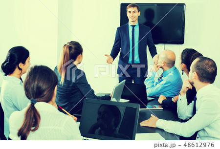 Manager making speech during business meeting 48612976