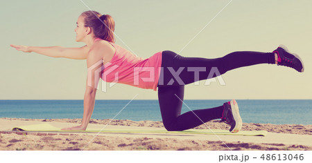 Female training at sea beach Female training at sea beach 48613046