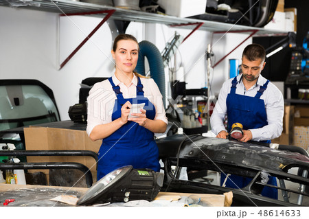 Female mechanic recording list of works Female mechanic recording list of works 48614633