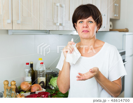 sad mature woman 48614700