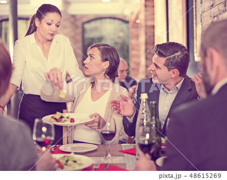 Company expressing dissatisfaction with waitress about food Company expressing dissatisfaction with waitress about food 48615269