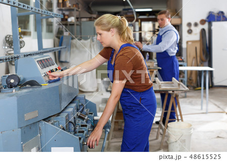Adult female working in workroom Adult female working in workroom 48615525
