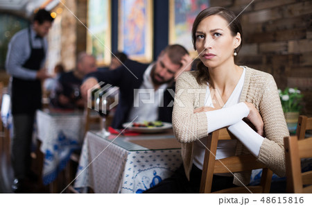 quarreled visitors female and male in restaurant quarreled visitors female and male in restaurant 48615816