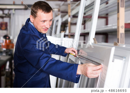 Production worker with PVC windows Production worker with PVC windows 48616693
