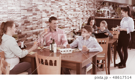 Family dining and talking 48617514