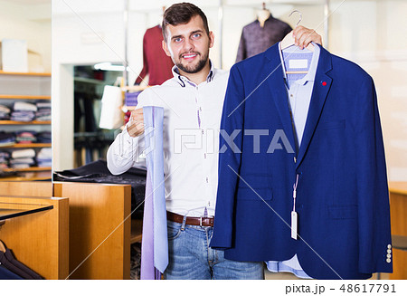 owner guy displaying jacket 48617791