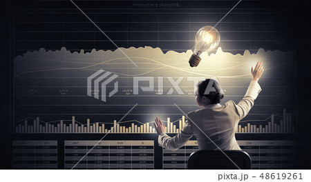 Businesswoman using media panel 48619261