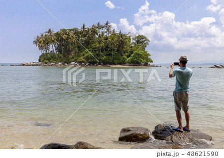 tourist man standing on the stone  48621590