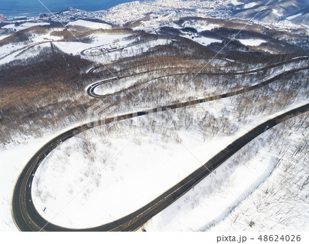 小樽 毛無山の峠道 空撮 の写真素材