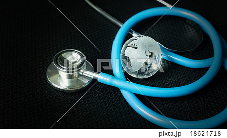 The stethoscopes on black background  48624718