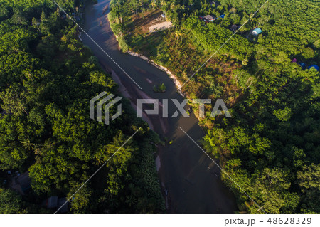 scenic of rain forest with curve of river sunrise scenic of rain forest with curve of river sunrise 48628329