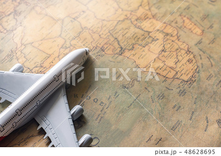 Airplane on paper map for travel adventure 48628695
