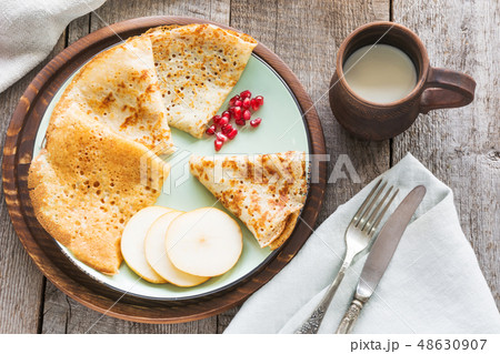 Tasty russian breakfast of pancakes with hone. Tasty russian breakfast of pancakes with hone. 48630907