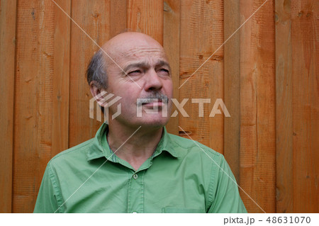 Caucassian man grimacing, portrait. Caucassian man grimacing, portrait. 48631070