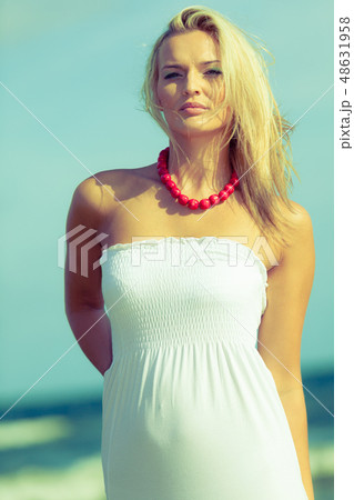Nice female enjoying nature and beach. Nice female enjoying nature and beach. 48631958