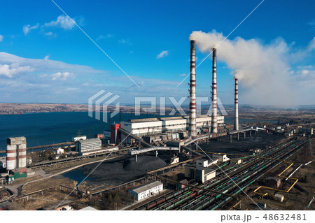 Old thermoelectric plant with big chimneys Old thermoelectric plant with big chimneys 48632481