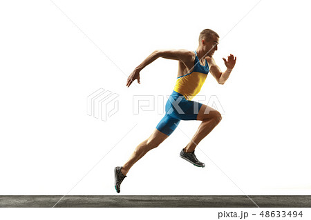 Young caucasian man running or jogging isolated on white studio background. Young caucasian man running or jogging isolated on white studio background. 48633494
