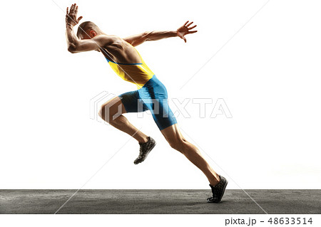Young caucasian man running or jogging isolated on white studio background. 48633514