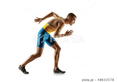 Young caucasian man running or jogging isolated on white studio background. 48633578