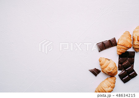 chocolate and croissants background, confectionery chocolate and croissants background, confectionery 48634215