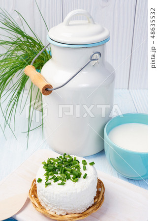 mug with milk on vintage table mug with milk on vintage table 48635532