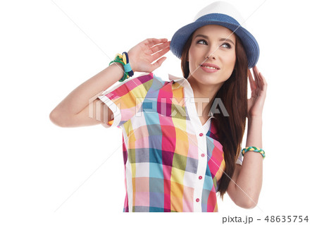 Summer smiling woman in studio portrait 48635754