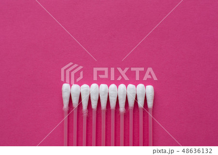 Closeup top view on cotton buds laid in a Closeup top view on cotton buds laid in a 48636132