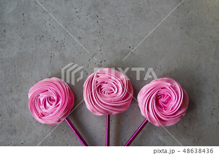 Cool sweet meringues in the roses form 48638436